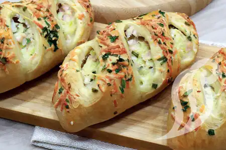 Pão de Mandioquinha com Peito de Peru e Alho Poró Pão de Mandioquinha com Peito de Peru e Alho Poró